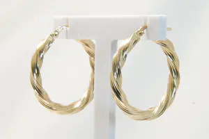 89 - 14 karaats paar geelgouden holle gedraaide oorringen kaufen? Bieten Sie von 195!