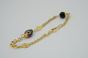 2523-  Surinaams 18 karaats geel-gouden zg. Alla Kondre armband - gekeurd kopen? Bied vanaf 180!