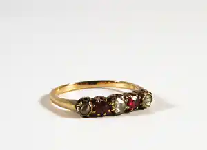 14 kt. geelgouden rijring bezet met diamanten en robijn verkocht voor € 150!