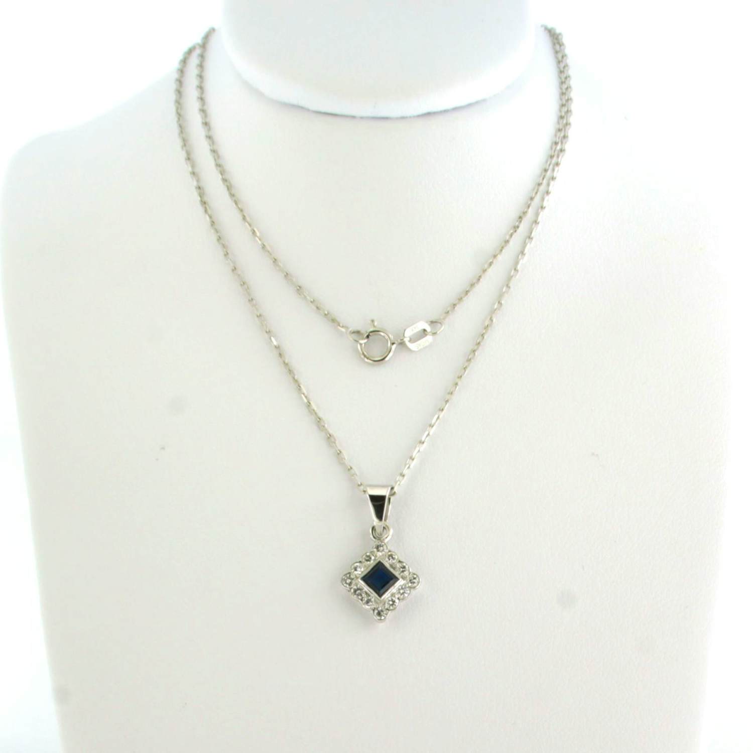 14k wit gouden collier met hanger bezet met saffier en diamant 0.24 ct verkocht voor € 380!