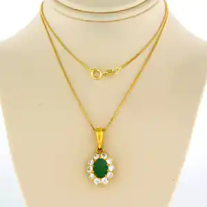 18k gouden collier met een entourage hanger bezet met smaragd en diamant verkocht voor € 700!