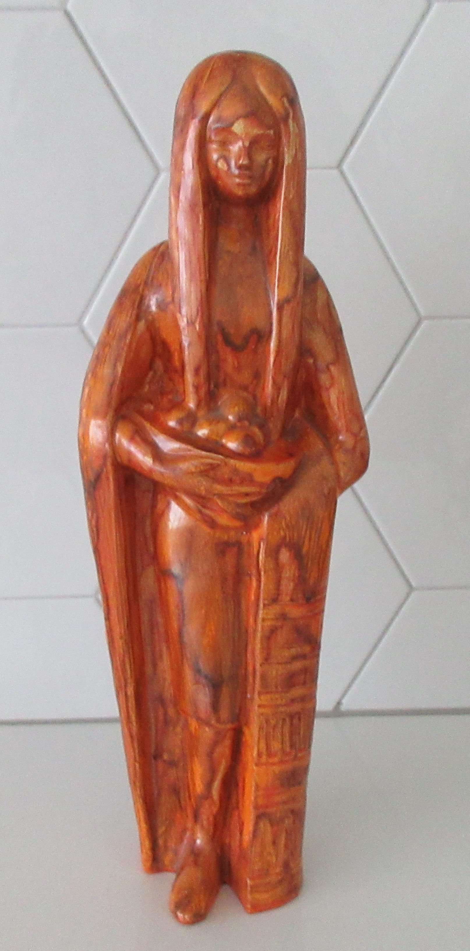 Niet of onleesbaar gesigneerd - Grote oranje art deco faience plastiek van een jonge vrouw verkocht voor € 1!