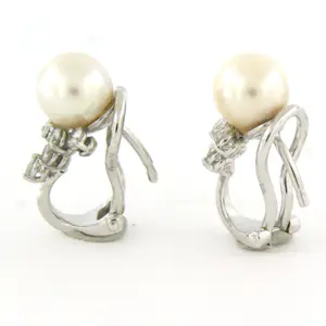 18k witgouden oorclips met parel en briljant geslepen diamant 0.50ct kopen? Bied vanaf 650!