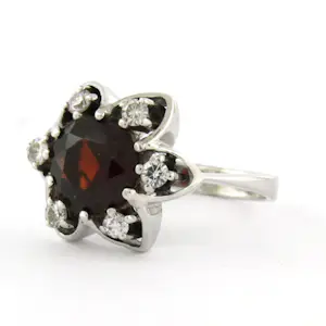 14k gouden ring met centraal granaat en briljant geslepen diamant tot. 0.24ct kopen? Bied vanaf 600!