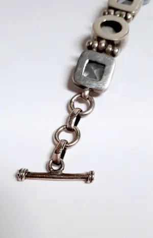 Zilveren Armband bezet met ovale facetgeslepen Aquamarijn en ovale turkoois kopen? Bied vanaf 85!