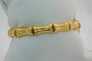 84- Surinaamse 18 krt geel-gouden zg. "Bamboe" armband - glad/ruw model kopen? Bied vanaf 470!