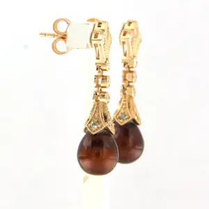 14k gouden oorhangers bezet met parel en diamant 0.35 ct kopen? Bied vanaf 500!