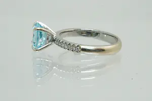 54 - Chique 18Kt witgouden & diamanten ring 0.15ct briljant en grote Aquamarijn kopen? Bied vanaf 280!