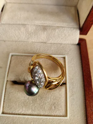 Krista Vandevelde - Creatie: romantische gouden ring (18KT) met diamant en Tahitiaanse parel kopen? Bied vanaf 450!