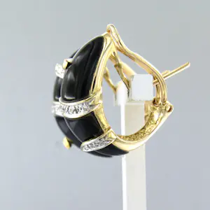 Acheter18k bicolour gouden oorclips met onyx en briljant geslepen diamant tot. 0.20ct? Enchérissez de 1400!
