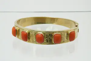 35-  Zware & fraai bewerkte 14 karaat gouden armband met bloedkoraal kopen? Bied vanaf 1400!
