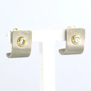 14k bicolour gouden oorknoppen bezet met briljant geslepen diamant tot. 0,10ct kopen? Bied vanaf 450!