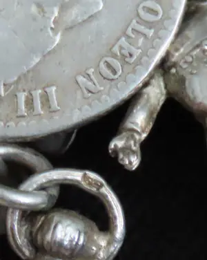 Antieke zilveren (kinder) bedel armband kopen? Bied vanaf 250!