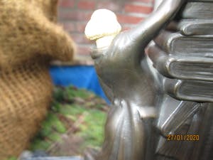 Brons (Onbekend) - Uniek brons boekensteun met aardewerk hoofdje 2 stuks kopen? Bied vanaf 75!