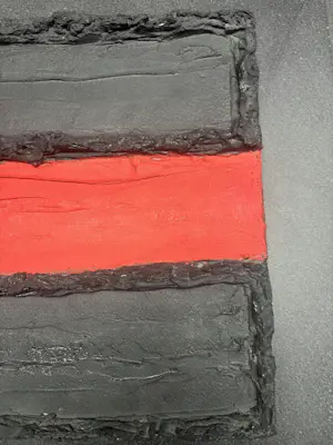 Onbekend - Zwart met rode banen kopen? Bied vanaf 20!