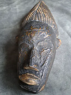 Akan - "Metal Face" kopen? Bied vanaf 45!