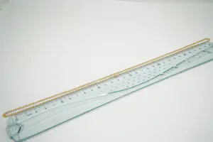 57 - Fijn en relatief lang 14 Krt geel gouden collier met fantasieschakeltjes kopen? Bied vanaf 290!