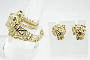 80 - Aparte opengewerkte 18krt geelgouden SET van panter ring en oorstekers kopen? Bied vanaf 400!