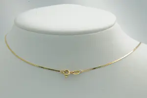 35 - Fijn en sierlijk opengewerkt 14Krt gouden halssieraad met diamant en jade kopen? Bied vanaf 305!