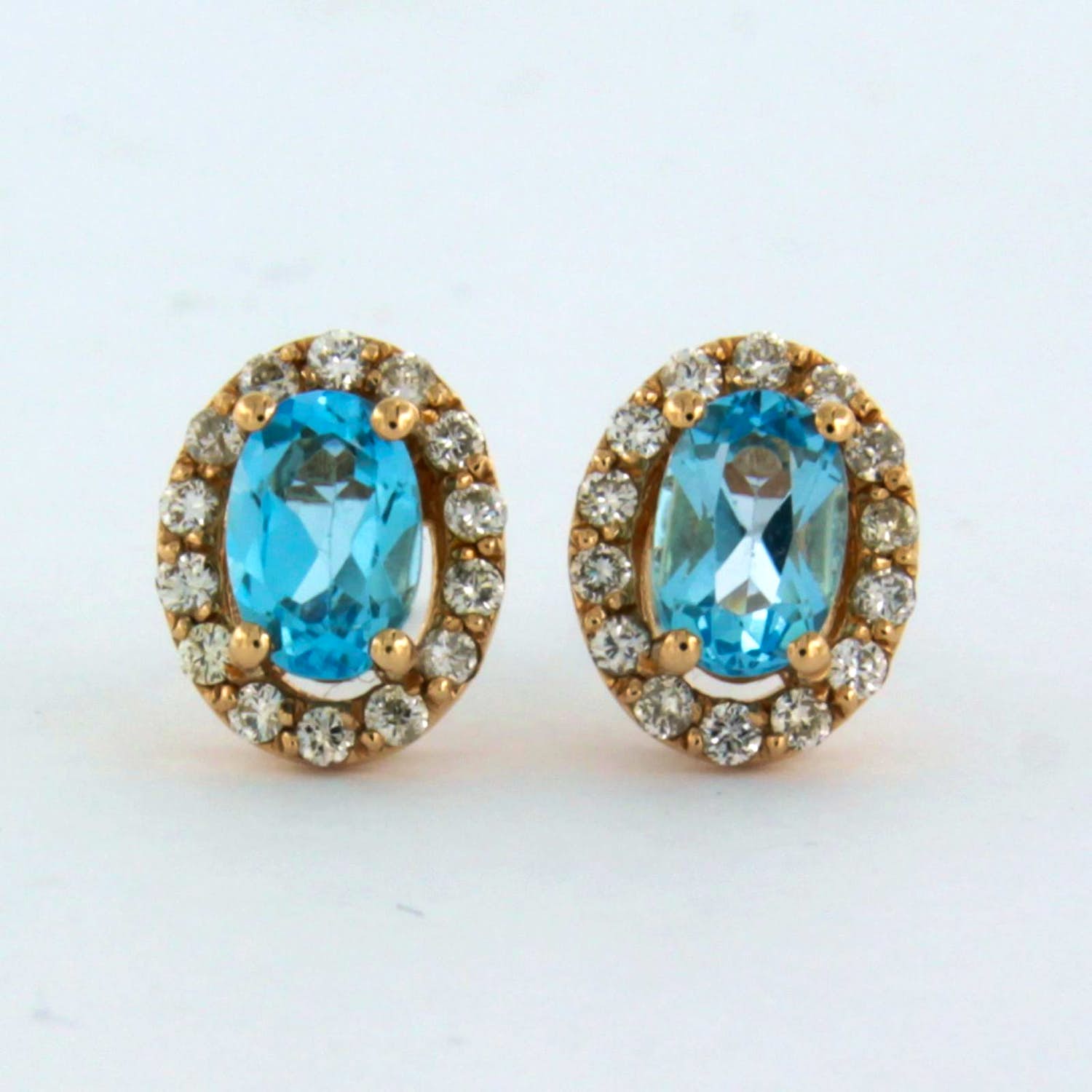 14k rosé gouden entourage oorknoppen met topaas en briljant geslepen diamant verkocht voor € 375!