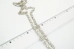 57 -  Lang (70cm) Surinaams 1e geh. zilveren Konings collier met mattenkloppers kopen? Bied vanaf 65!