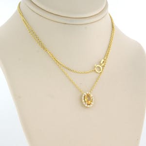 14kgouden collier met hanger bezet met gele saffier en briljant geslepen diamant kopen? Bied vanaf 1!