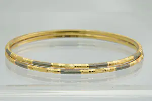 28 - Set van TWEE hoog-gehalte 22Krt bicolor gouden "rinkel" armbanden kopen? Bied vanaf 1080!