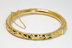 29 - Gedeeltelijk 20 karaats geelgouden ajour bewerkt armband met kunststof kern kopen? Bied vanaf 750!