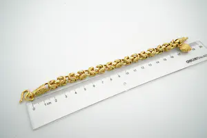 79 - Zware 20 krt geel-gouden open Konings schakel armband -met grote harthanger kopen? Bied vanaf 1560!