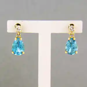 18k geel gouden oorhangers bezet met topaas en diamant 0.08 ct - G/H - VS/SI verkocht voor € 225!