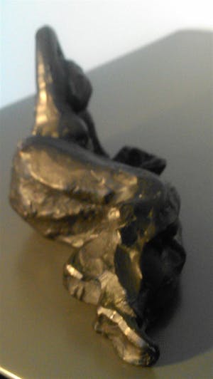 Brons (Onbekend) - liggend lezende vrouw JVG kopen? Bied vanaf 39!