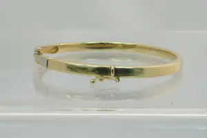 76 - Elegante bicolor 14Krt gouden dames armband met 10 diamanten (0.20ct) kopen? Bied vanaf 490!