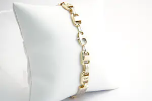109- Zware 18Krt bicolor gouden & diamanten (0.50ct) fantasie armband kopen? Bied vanaf 1670!