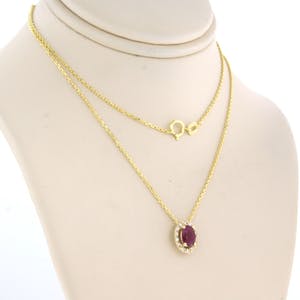 14k gouden collier met hanger bezet met robijn en briljant geslepen diamant kopen? Bied vanaf 200!