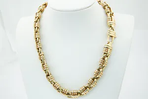 Groot en zwaar (90gram) 18 karaats bi-color gouden Givenchy stijl halssierraad kopen? Bied vanaf 3600!