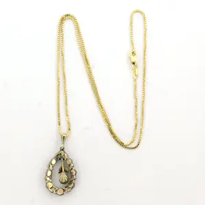 14k gouden collier met goud en zilveren hanger bezet met roos geslepen diamanten kopen? Bied vanaf 510!