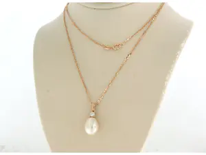 14k rosé gouden collier met hanger bezet met parel en briljant geslepen diamant kopen? Bied vanaf 170!