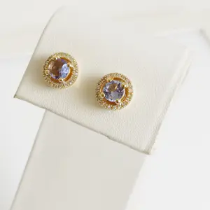 AcheterOorbellen van tanzaniet met een diamanten halo.? Enchérissez de 700!