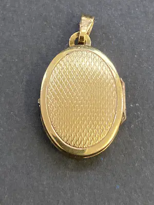 18 karaats geelgouden bewerkt medaillon kopen? Bied vanaf 145!