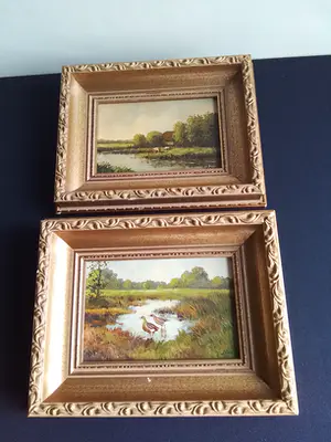 Niet of onleesbaar gesigneerd - 2 fraaie landschapsschilderijtjes met koeien en eenden kopen? Bied vanaf 1!