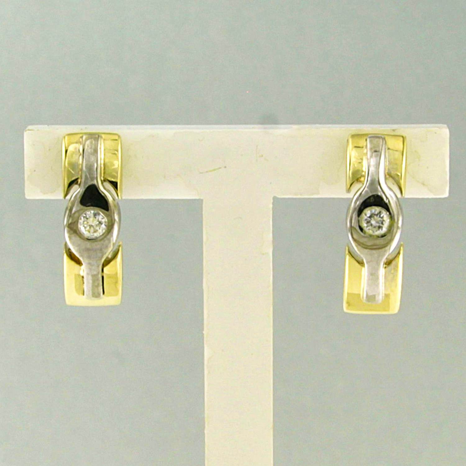 14k bicolour gouden oorknoppen bezet met briljant geslepen diamant tot. 0,06ct kopen? Bied vanaf 250!
