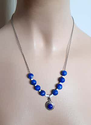 Zilveren ketting met lapis  lazuli hanger verkocht voor € 1!
