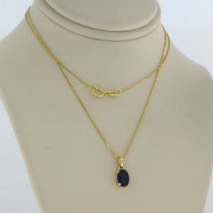 14k geel gouden collier met hanger bezet met saffier 0,70 ct - 45 cm lang kopen? Bied vanaf 150!