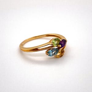 handgemaakte 18kt gouden ring met kleur edelstenen maat 54(17,5) 2,10 gr kopen? Bied vanaf 120!