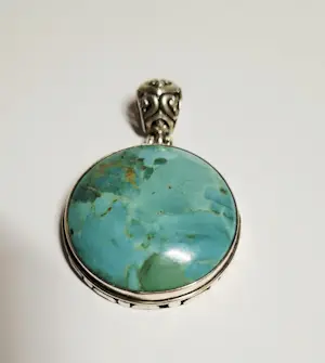 Zilveren ronde hanger is een met turkoois kopen? Bied vanaf 60!