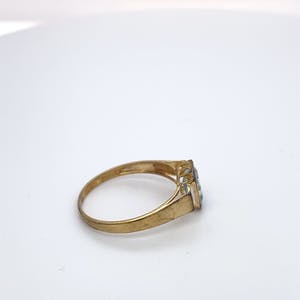 Buy 8kt gouden ring+topaas+kleurloze stenen, maat 56/17,75, 1,37 gr? Bid from 65!