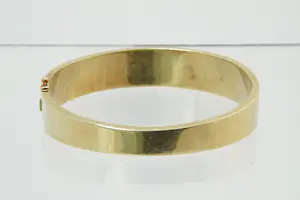 35-  Zware & fraai bewerkte 14 karaat gouden armband met bloedkoraal kopen? Bied vanaf 1400!