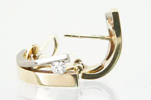 Prachtige set 18 krt bi-color gouden dames oorclips gezet met ca 0.30ct diamant. kopen? Bied vanaf 350!