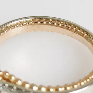 AcheterRobijn- en diamanten ring? Enchérissez de 2000!