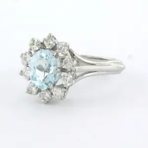 18k gouden ring met topaas en erom heen briljant geslepen diamant tot. 0.40ct kopen? Bied vanaf 660!